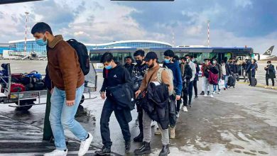 Indian students evacuated from war-zone Ukraine board an airplane to return to India